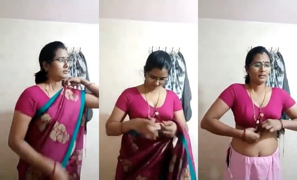 Beautiful_Chasmish_Bhabhi_Removing_Sari_In_Bathroom.jpg